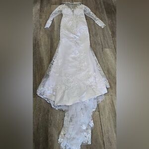 Brand new white lace wedding dress with floral details size medium